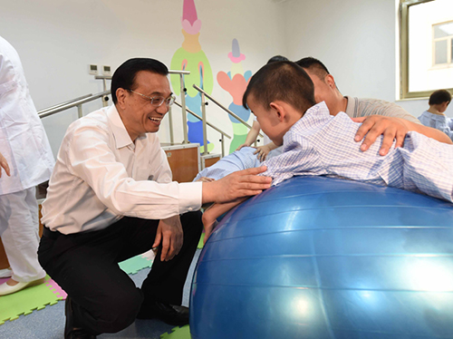 這三年，總理牽掛的殘疾人群體，迎來(lái)哪些暖政？