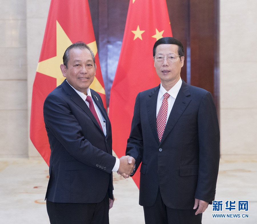  9月11日，中共中央政治局常委、國務院副總理張高麗在廣西南寧會見前來出席第十四屆中國－東盟博覽會和中國－東盟商務與投資峰會的越南常務副總理張和平。新華社記者王曄攝