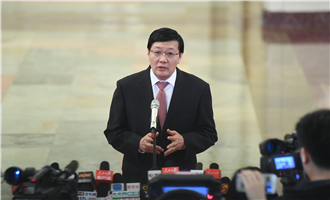 全國社?；鹄硎聲硎麻L樓繼偉接受采訪