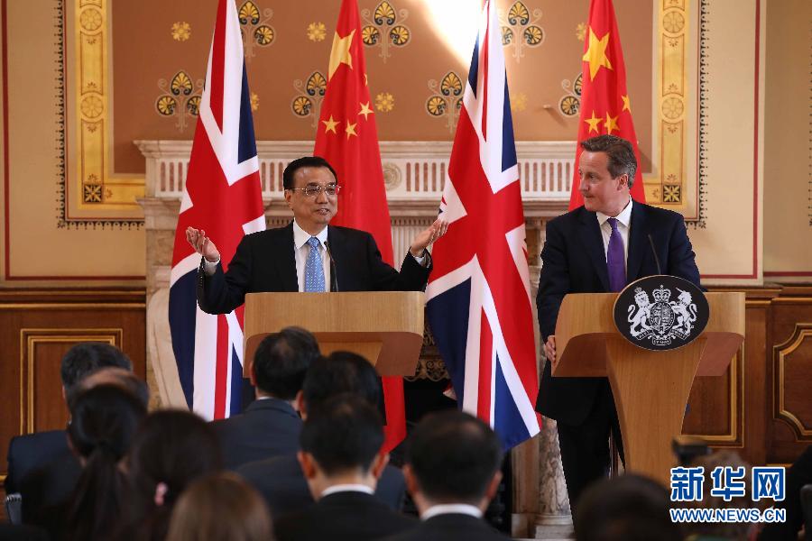 6月17日，國務院總理李克強同英國首相卡梅倫在倫敦舉行中英總理年度會晤后共同會見記者。新華社記者 龐興雷 攝