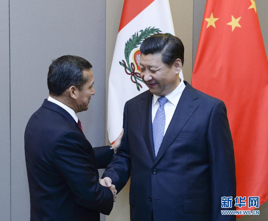 7月16日，國(guó)家主席習(xí)近平在巴西首都巴西利亞會(huì)見(jiàn)秘魯總統(tǒng)烏馬拉。新華社記者 劉建生 攝 