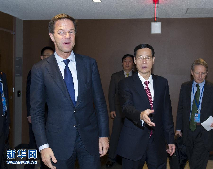 9月23日，出席聯(lián)合國氣候峰會的國家主席習(xí)近平特使、國務(wù)院副總理張高麗在紐約聯(lián)合國總部會見荷蘭首相呂特。 新華社記者 王曄 攝 