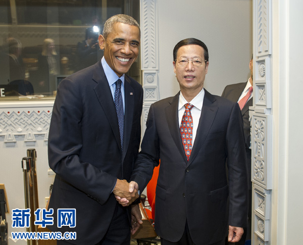 9月23日，國家主席習(xí)近平特使、國務(wù)院副總理張高麗在紐約會見出席聯(lián)合國氣候峰會的美國總統(tǒng)奧巴馬。 新華社記者王曄攝