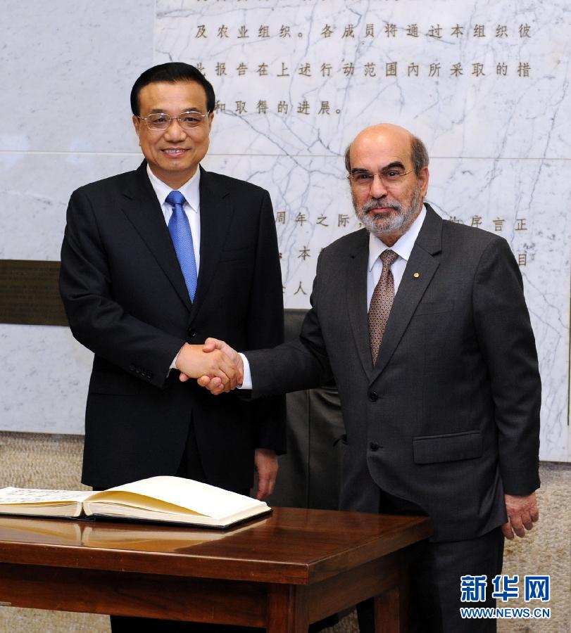 10月15日，中國國務院總理李克強在羅馬會見聯(lián)合國糧農(nóng)組織總干事格拉齊亞諾。 新華社記者 饒愛民 攝