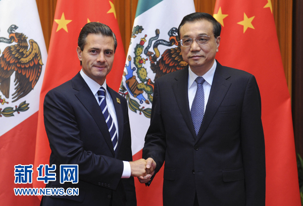 11月11日，國務院總理李克強在北京人民大會堂會見來華進行國事訪問并出席亞太經(jīng)合組織第二十二次領導人非正式會議的墨西哥總統(tǒng)培尼亞。新華社記者張鐸 攝 