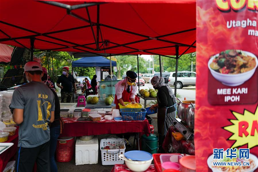 （國際&middot;圖文互動）（5）通訊：前方總有機(jī)遇&mdash;&mdash;記馬來西亞一位飛行員疫情下擺攤再就業(yè)