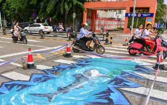 &ldquo;海洋世界&rdquo;3D立體斑馬線亮相?？? />  
<div>“海洋世界”3D立體斑馬線亮相海口</div>
</a> 
</div>
<div   id=